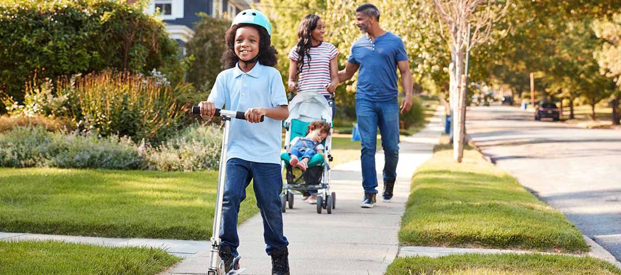 family walking on the street