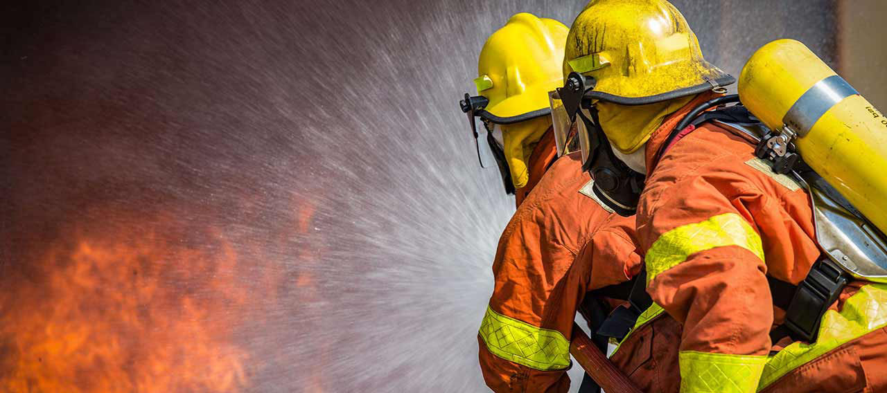 fire fighters battling blaze