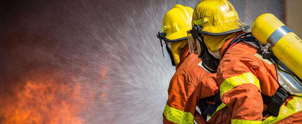 fire fighters battling blaze