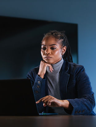 woman accessing Chubb Agent Portal from laptop
