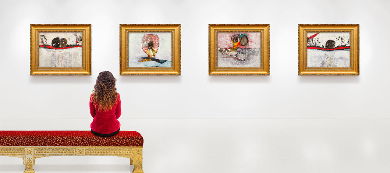 young woman visits an art gallery 